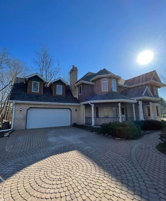 Two story home with newly replaced roof