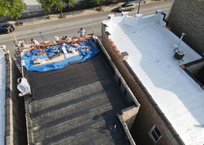 Buffalo Roofing Contractors replacing a flat roof in Chicago